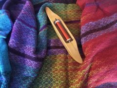 Vibrant threads dominate this subtle woven pattern