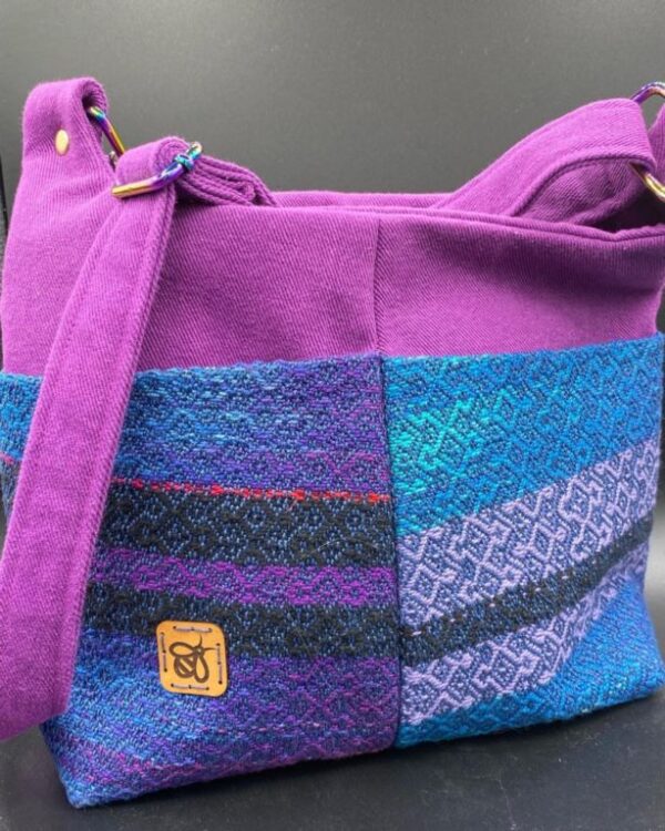 purple woven handbag